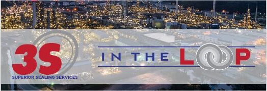Newsletter web A city with lights and buildings in the background.